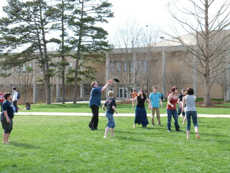 Will the Computer Science Faculty Member catch the frisbee?